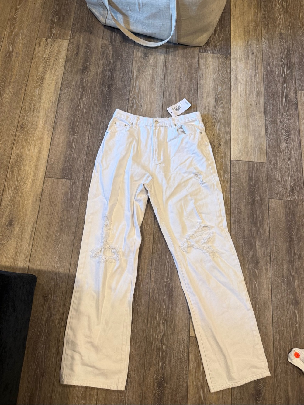 High-Rise White Women's Jeans with Distressed Knees